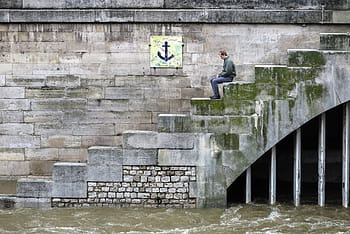 man, sits, steps, leading, flooded, seine river, paris, france, alone, sad, sitting