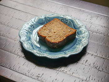 bananmutebrød, sitter, blå, tallerken, sollys., kake, valnøtt, tre, nærbilde, søt, bord