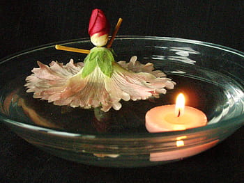 candle-lit, centerpiece, doll, made, hollyhock flower, floating, water, hollyhock doll, hollyhock, flower, candle