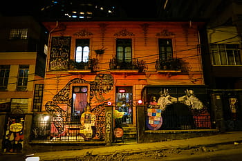 Building in La Paz, Bolivia, graffiti, mural, art, spray paint, building, windows, railings, sidewalk, dark
