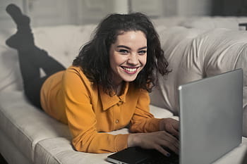 young, woman, yellow, button-up shirt, black, leggings, working, laptop, white, 20-25 Years, Couch