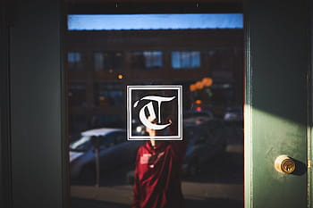 man, guy, door, glass, writing, lettering, building, street, city, urban, cars