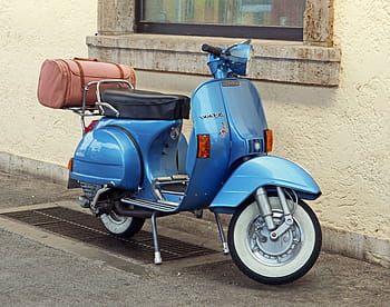 motor scooter, vespa, jewel, historically, restored, ready to start, blue, metallic, whitewall tires, leather suitcase, two wheeled vehicle