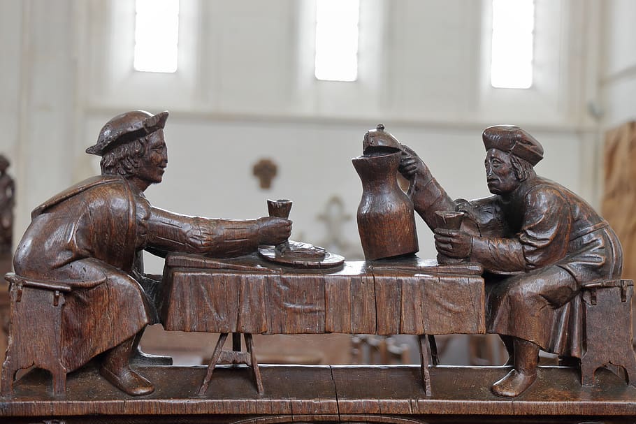 figures, wood, carving, choir stalls, church, zecher, drinkers, pot, wine, table