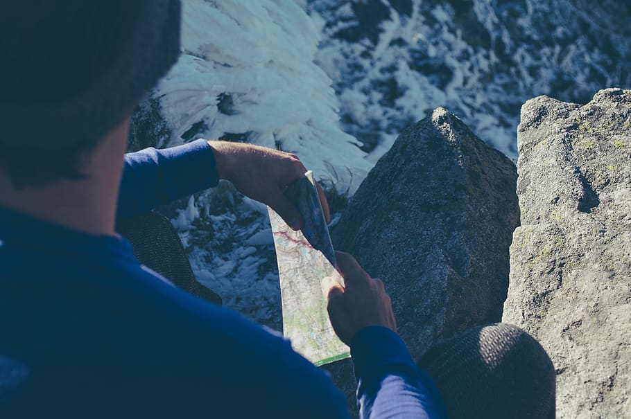 hiker, rest, break, summit, peak, top, map, rocks, mountain, nature, abyss