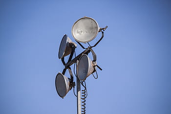 construction site generator lights, light, lamp, sky, metal, equipment, blue, spotlight, energy, bright, technology