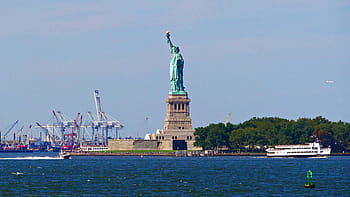 statue, liberty, boat traffic, cranes, viewed, staten island ferry, crossing, new, york harbor, way, island.
