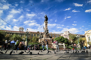 La Paz, Bolivia, landmark, monument, statue, people, pedestrians, pigeons, birds, buildings, architecture